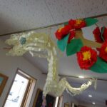 119　白へびと花